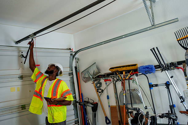 Professional Garage Door Installation technician working in Arcadia, WI